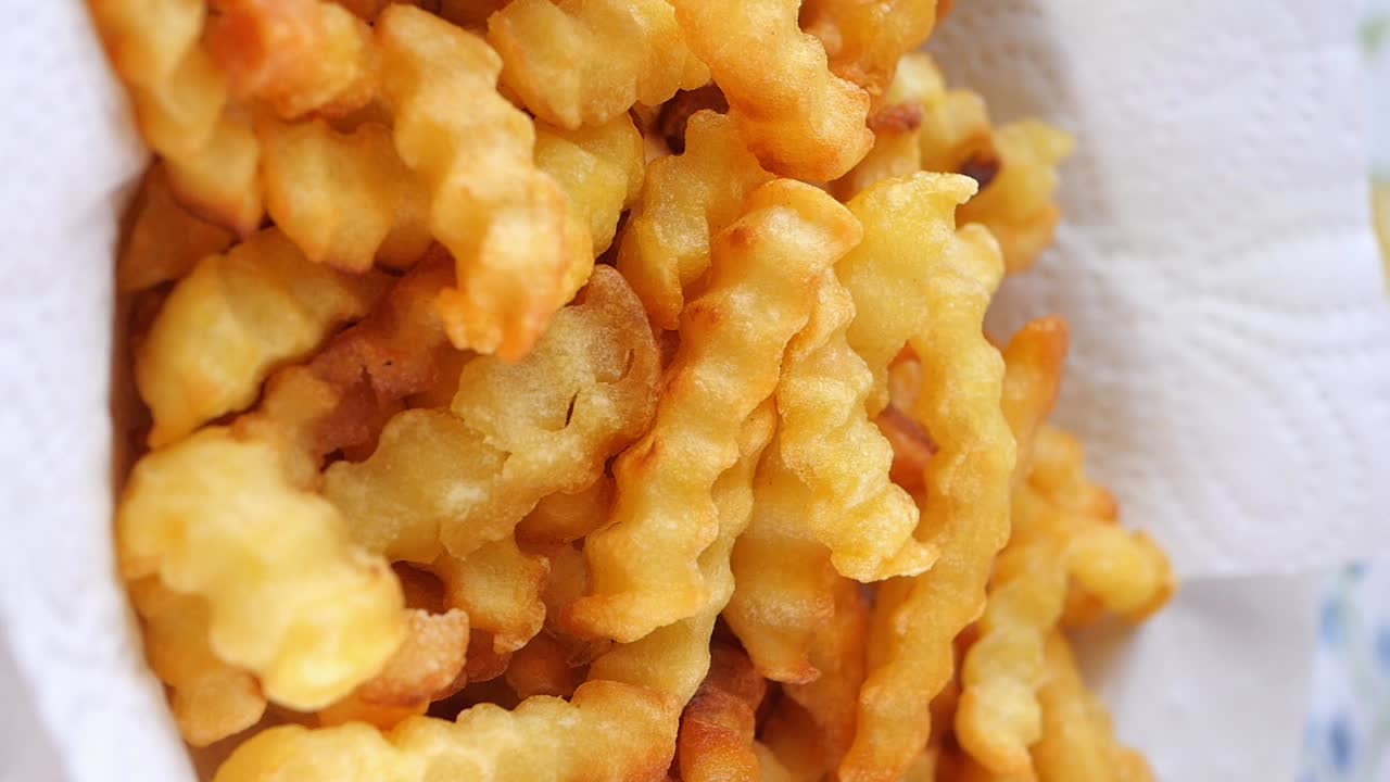 Close-up of Golden Crinkle Cut French Fries