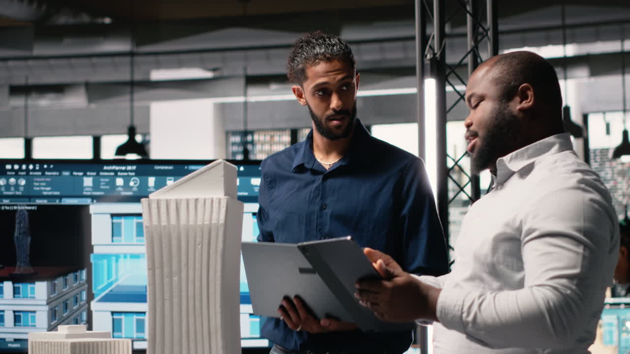 Vertical Video Real estate professionals evaluating property layout for site preparation