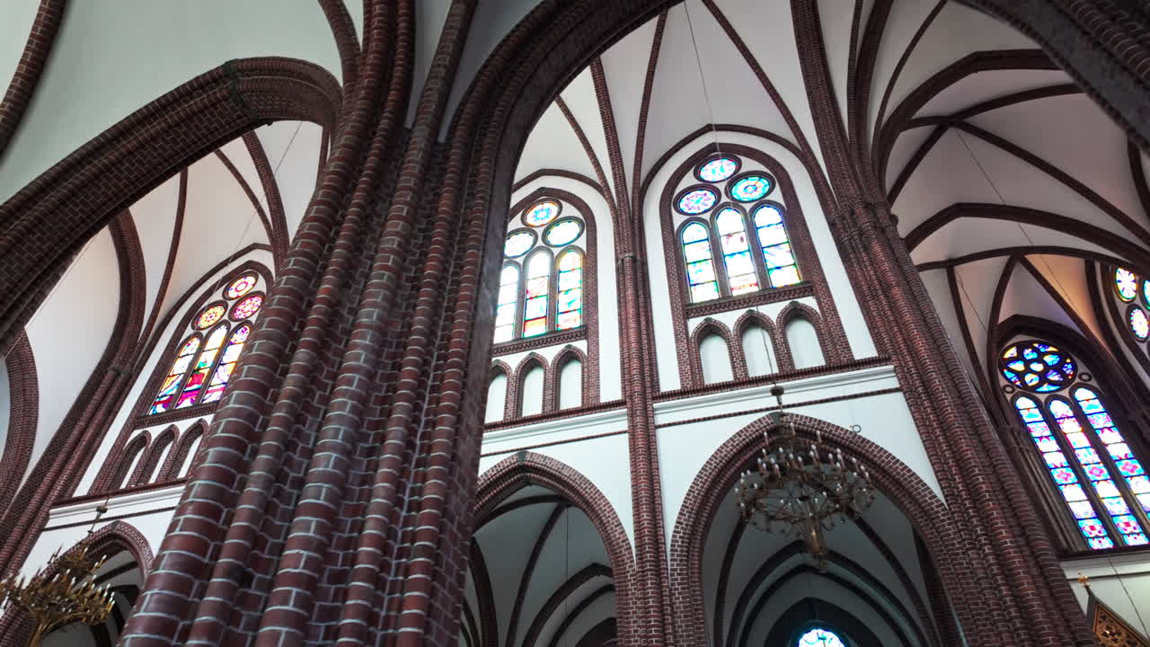 Saint Michael Archangel and Saint Florian Cathedral in Warsaw, showing intricate stained-glass windows