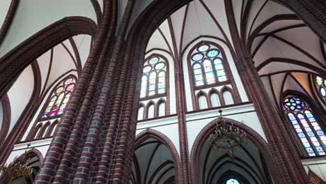 saint michael archangel and saint florian cathedral in warsaw, showing intricate stained-glass windows