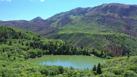 aerial shot maple lake on nebo loop up payson canyon above utah valley mountains