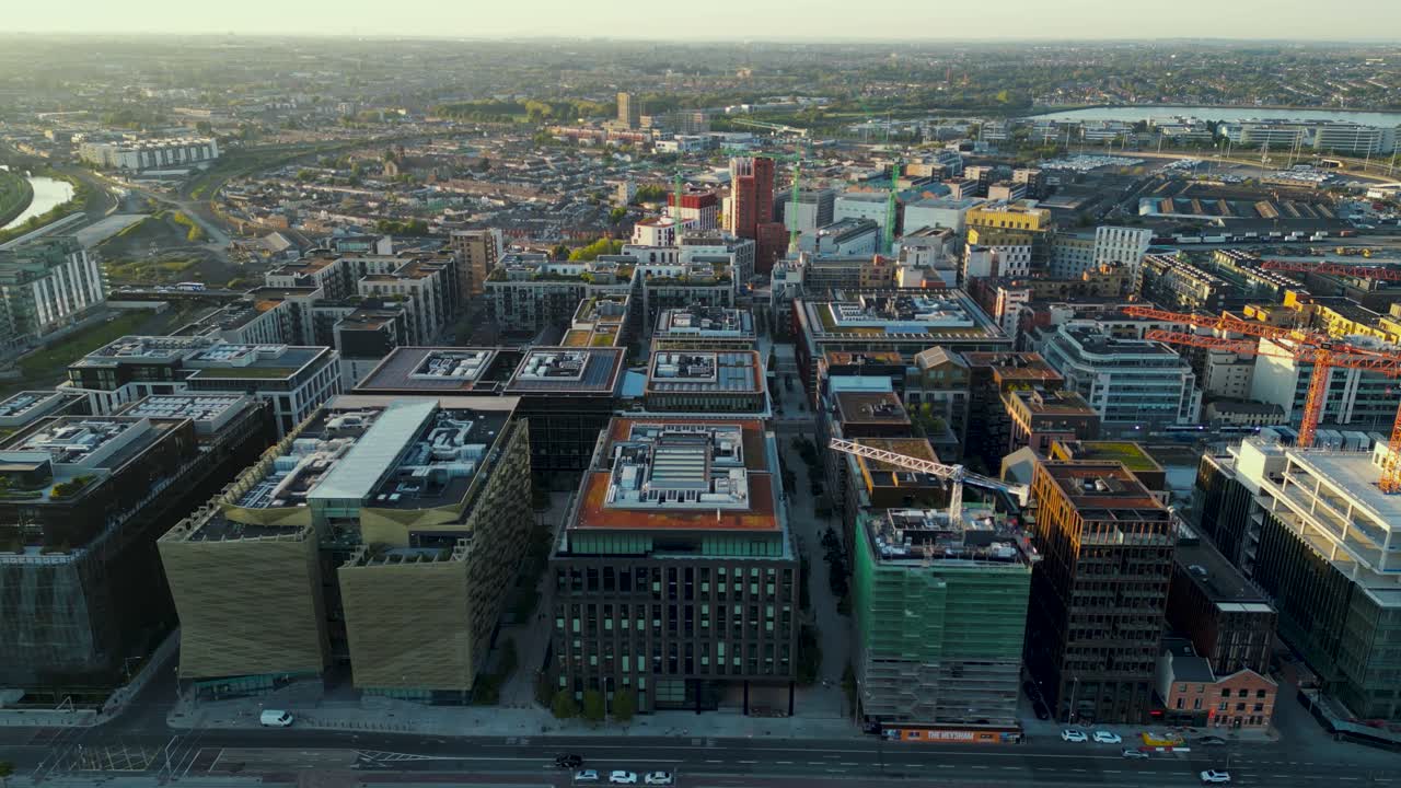 Aerial view of a new business area of Dublin - Modern new building on the banks of Liffey River in Point Village or East Wall area - Dublin city centre