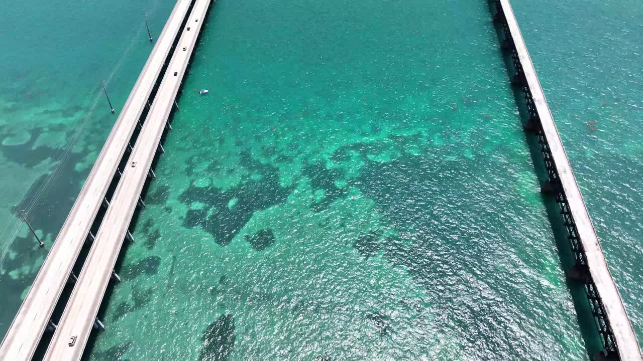 aerial over bridges clear water and coral in the florida keys