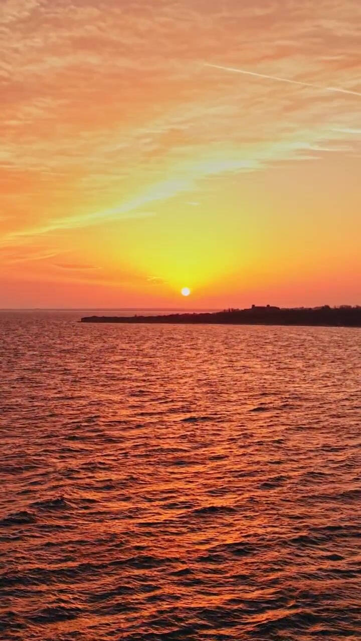 Sunset over the sea in Nesebar, Bulgaria with vibrant colors