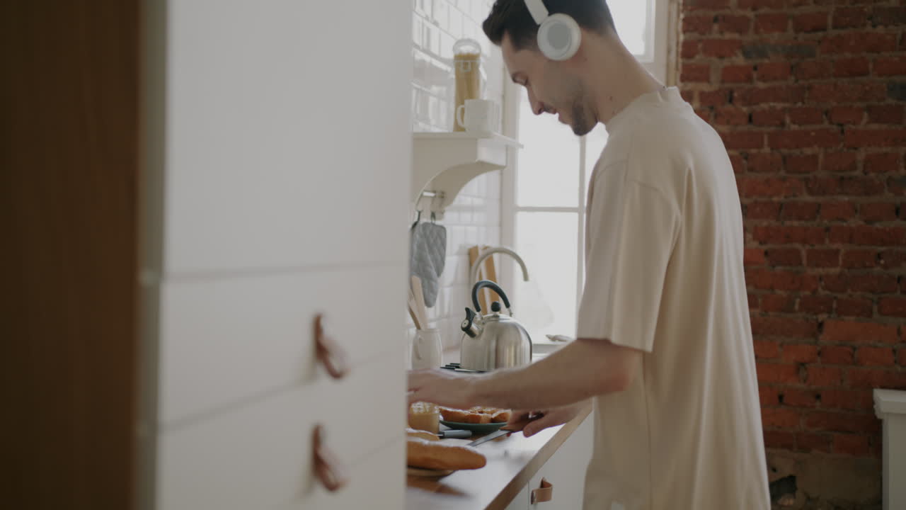 Man enjoying breakfast in the kitchen