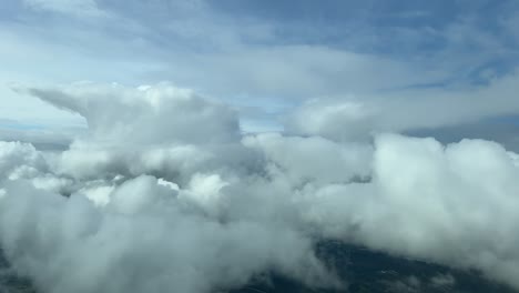 flying through a messy sky full of tiny cumulus