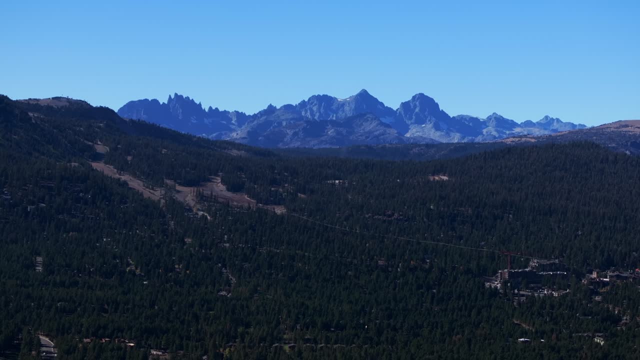 Minarets Vista scenic ridge Mammoth Lakes Mountain Ski Area aerial drone California Inyo forest McCoy Station Main lodge Upper Panorama Gondola summer autumn fall sunny blue sky gondola circle right