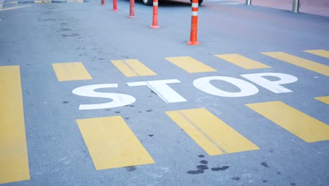 close up of a stop sign on the ground