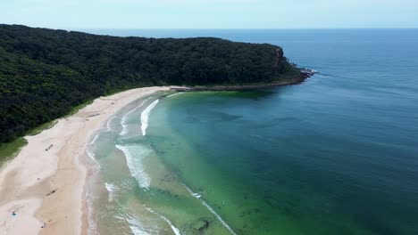drone aerial landscape headland coastline view durras north beach waves sand bay national park bushland tourism travel south coast nsw australia