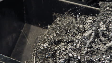 metal chips fall after metalworking. heap of metal shavings. iron swarf