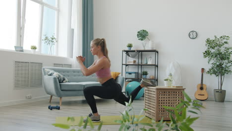 woman doing lunges at home