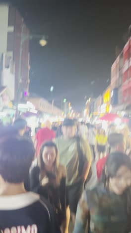 bustling night market street