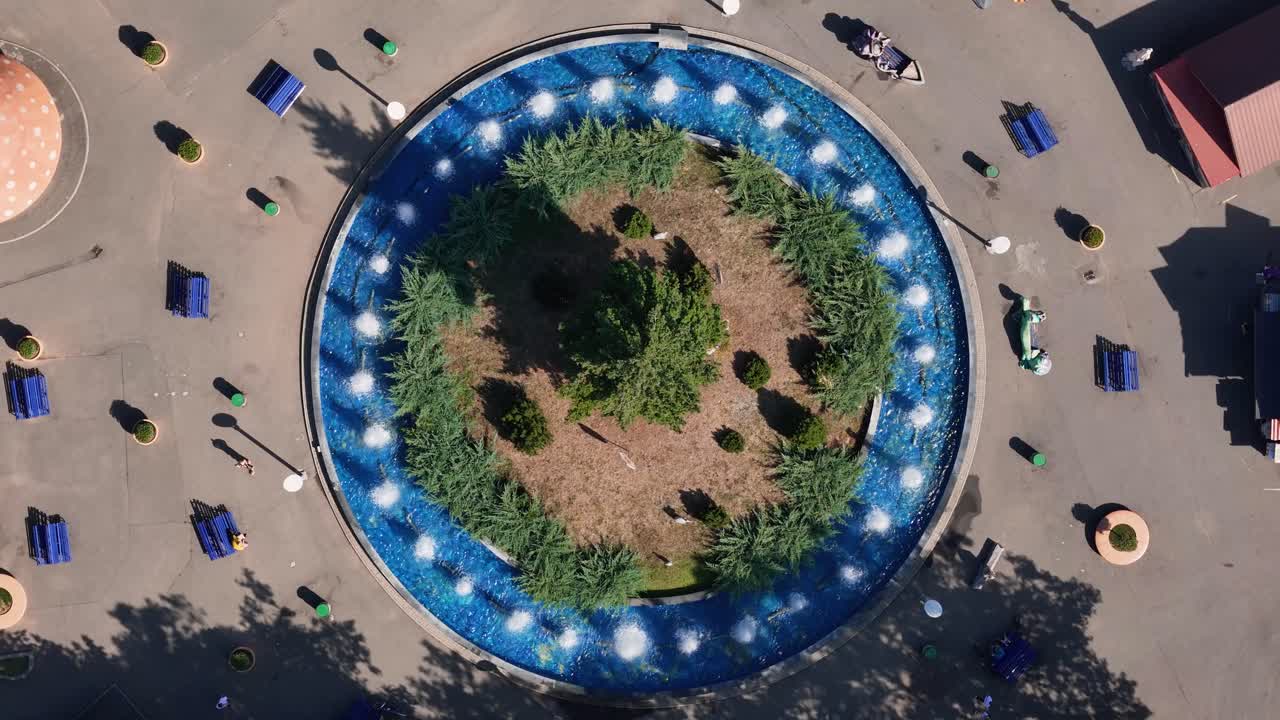 Aerial View of a Circular Fountain in a Park