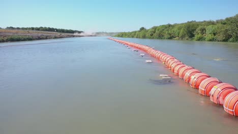 buoys on the rio grande, serving as a physical division of the mexico-usa border