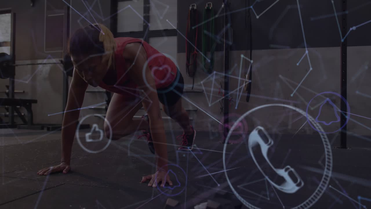 Woman driving knees for mountain climbers on studio floor, creating neon icons for workout tracking