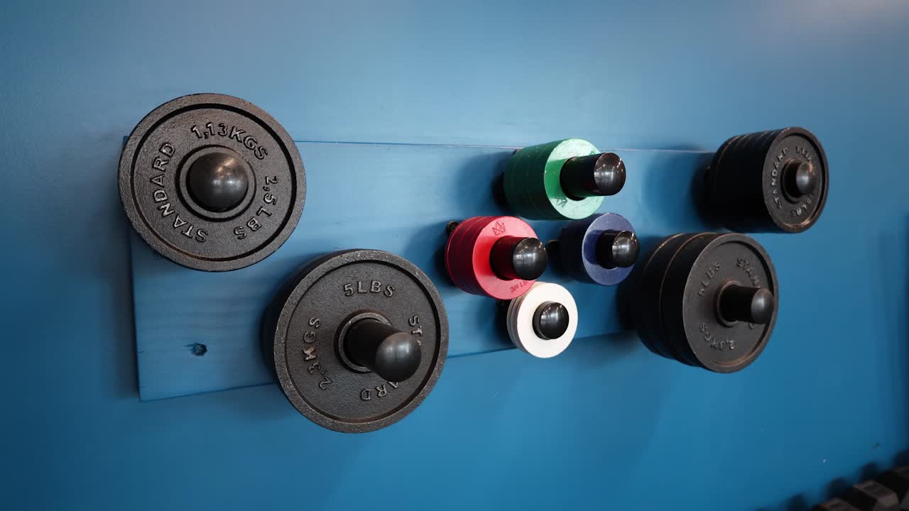 placas ponderadas para el levantamiento de barras