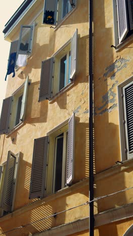 vintage italian building with shutters