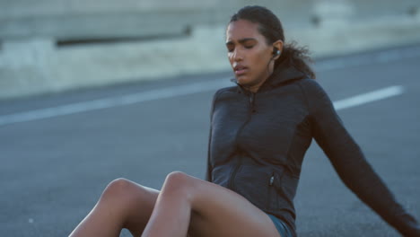 woman stretching outdoors