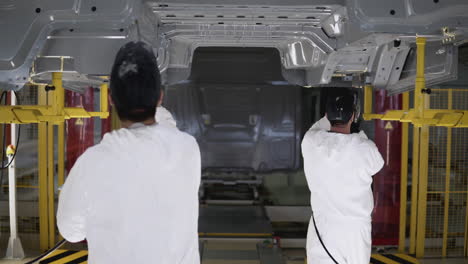 car body painting in a manufacturing plant