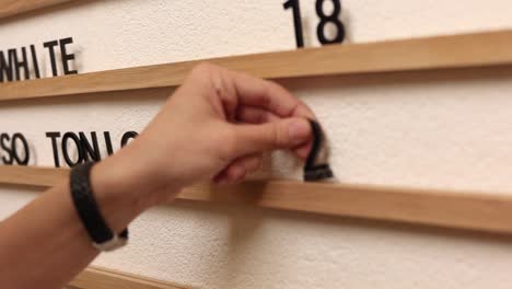 wooden wall organizer with numbered sections