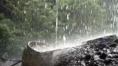 traditional way of collecting water from rain with urn the earthen jar