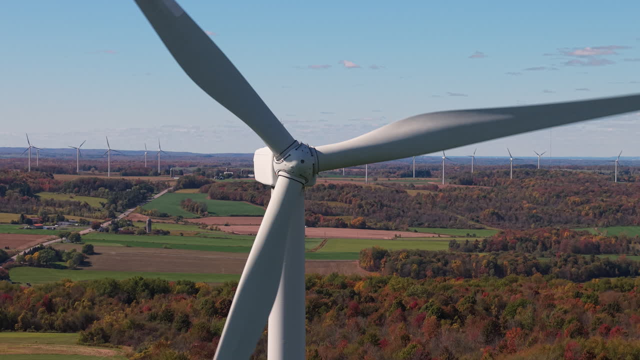 Wind Turbines in Autumn Landscape