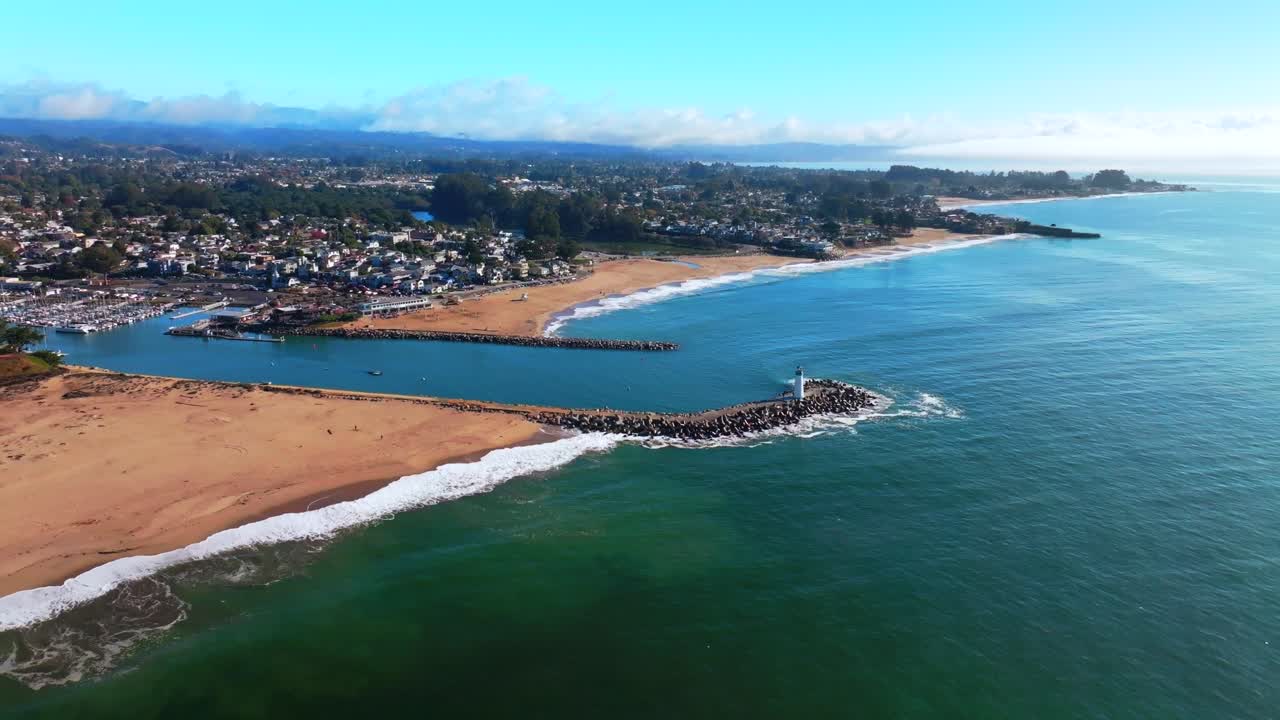 Pleasure Point SeaBright Blacks Beach Walton Lighthouse Monterey Bay Santa Cruz California aerial drone scenic landscape deep blue surf waves sand Pacific Ocean morning blue sky mist fog backwards up