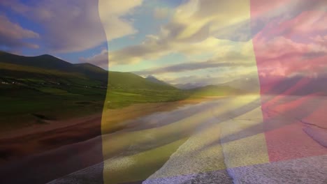 animación de la bandera de bélgica ondeando sobre el paisaje de la playa