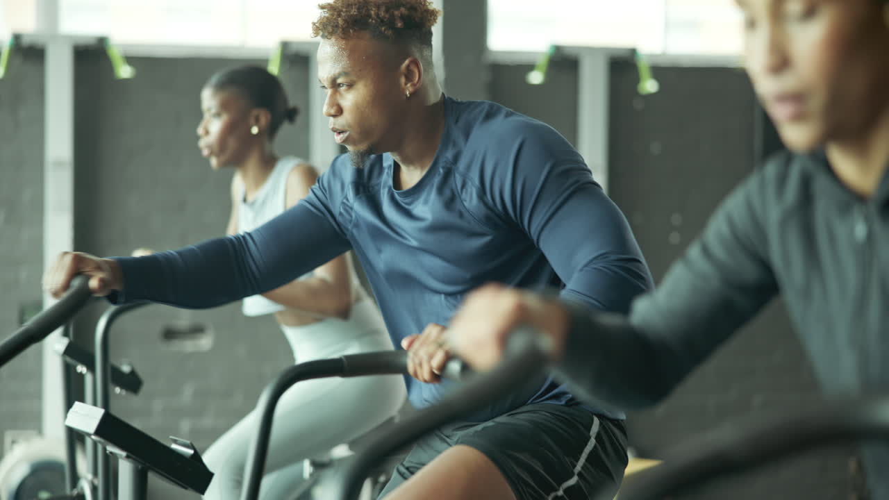 People exercising on stationary bikes