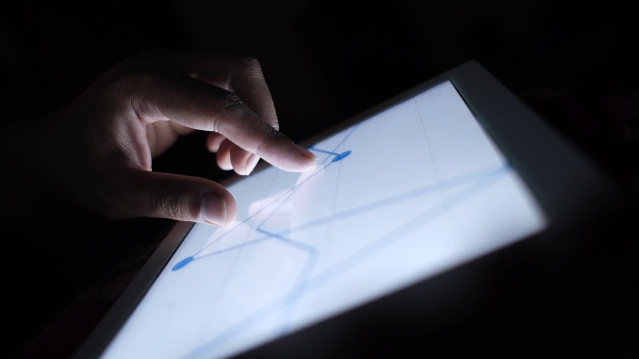 Person interacting with a tablet display