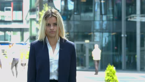 Happy-smiling-business-woman-at-office-park