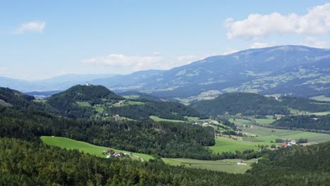 aerial slow pull back shot of soboth mountain pass in lavamünd, austria