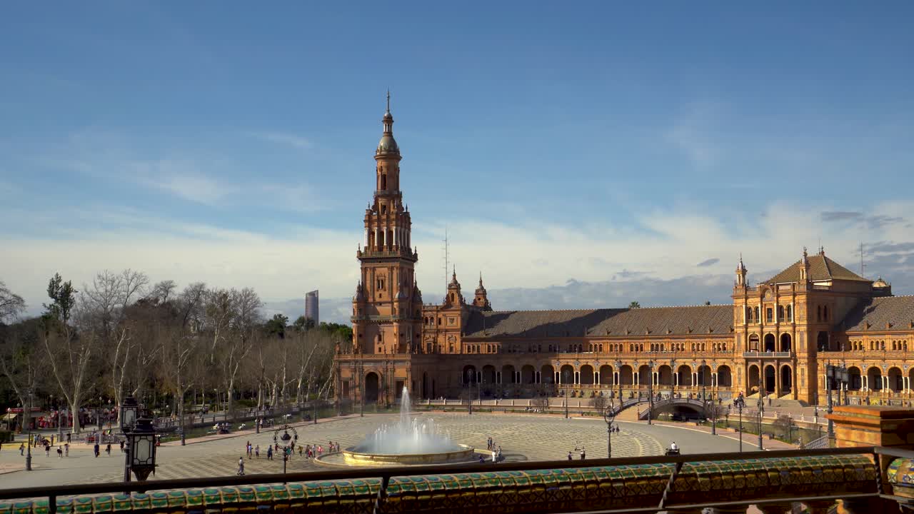 Plaza de España in Sevilla, gimbal-stabilized 4k footage, holiday destination, unrecognizable people walking around the popular public monument