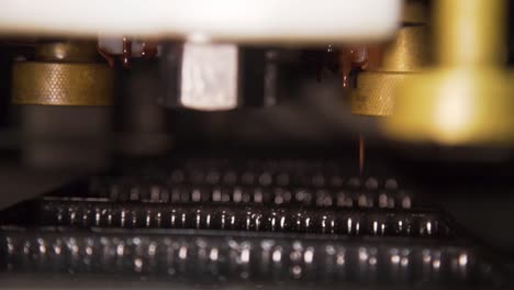 Cake-moulds-being-filled-at-a-cake-production-factory,-Slow-motion-closeup-shot