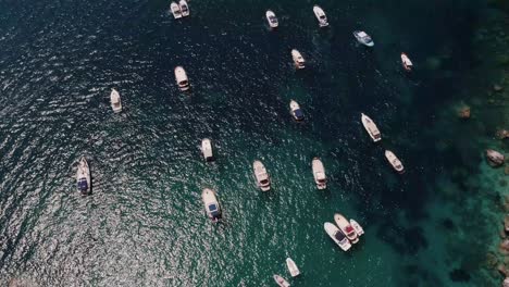 Overhead-aerial-view-of-luxury-yachts-off-the-coast-of-Italy