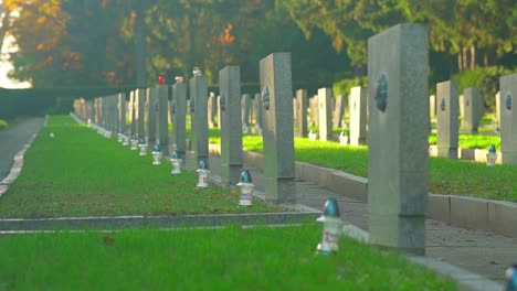 Candle-Lantern-In-Front-Of-Tombstone-In-The-Grave