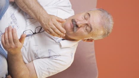 Vertical-video-of-The-sneezing-old-man.-Patient.