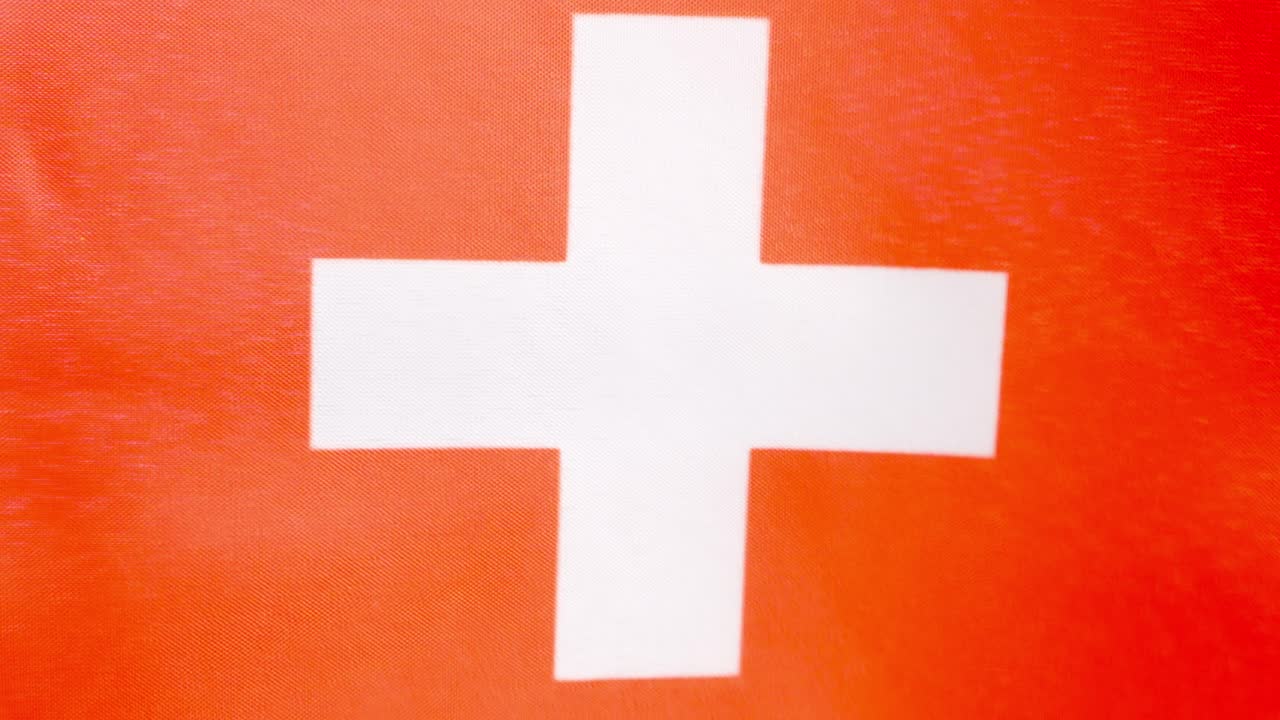 Switzerland national flag waving by the wind
