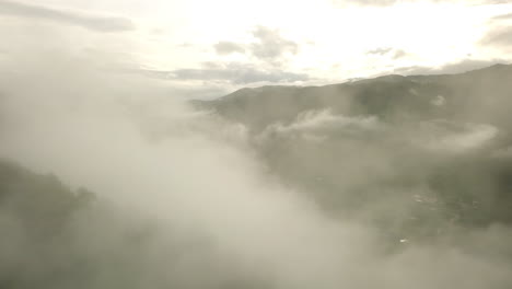 a breathtaking aerial scenery of lush green tropical rainforest mountain