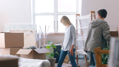 real estate, home and couple hug after moving