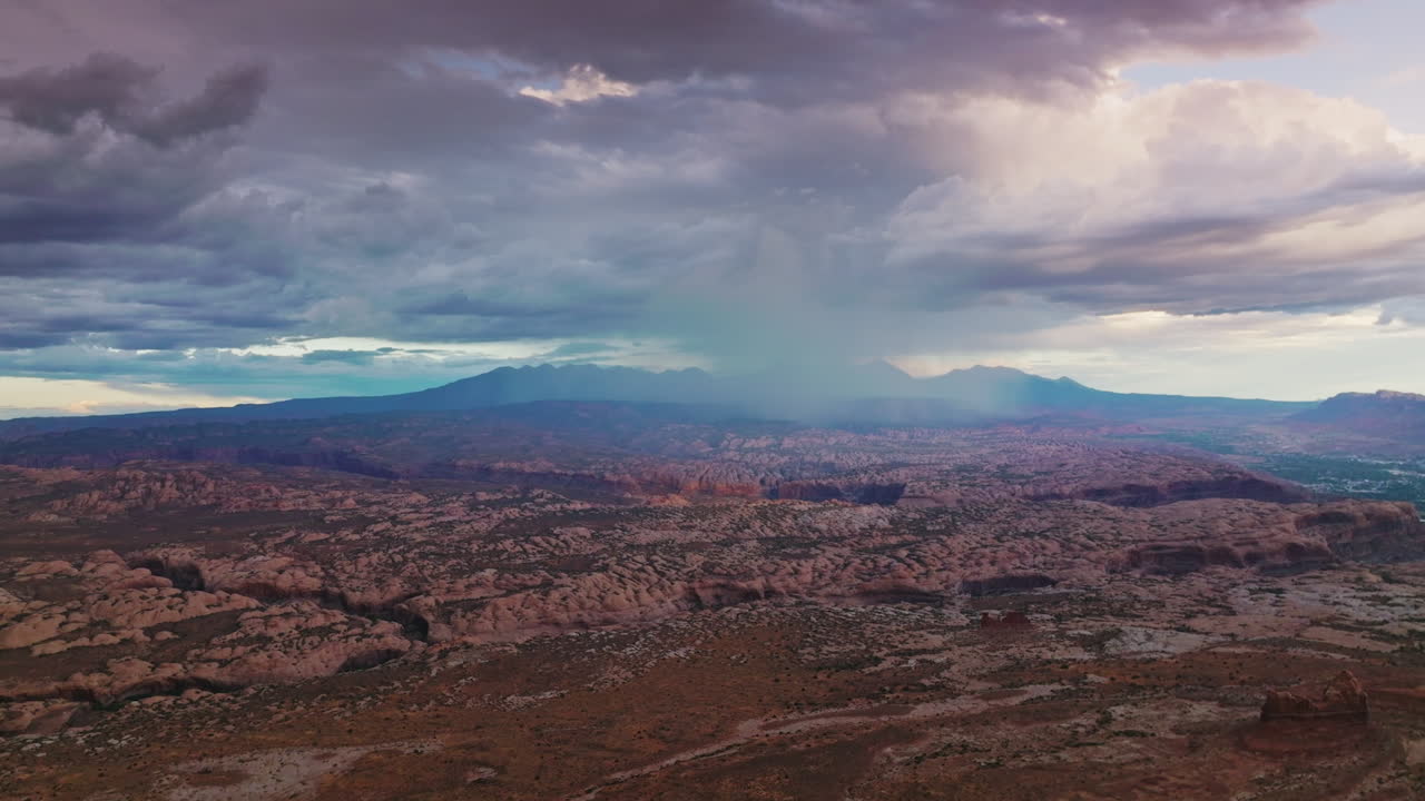 Fantastic scenic view of Zion national park in Utah, USA. Cumulus dramatic clouds accumulating over the rocks. Aerial view.