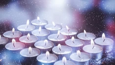 Falling-snow-with-Christmas-candles