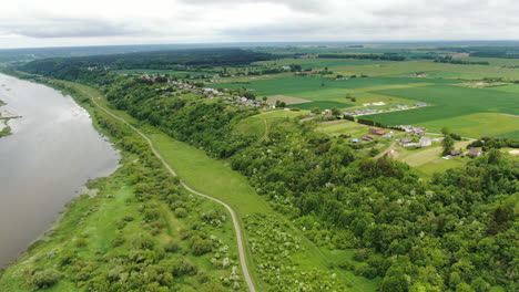 nemunas river slope and many private houses built on top, aerial drone view