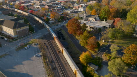 aerial view of a freight train traveling through kirkwood in st