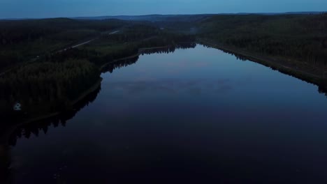 lake at dusk  drone shot pushing in