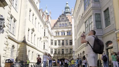 man tourist walking in dresden travel germany tours architecture lifestyle summer trip man tourist walking in dresden travel germany tours architecture lifestyle summer trip vacation europe tourism concept