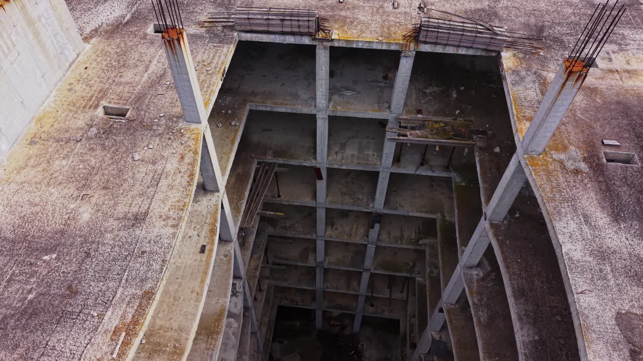 Aerial view of an abandoned building with open floors