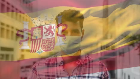 Animation-of-flag-of-spain-over-man-wearing-face-mask
