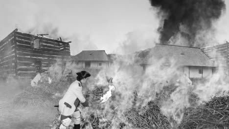 composizione degli effetti collaterali: villaggio in fiamme, durante la guerra