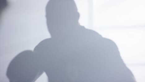 silhouette of people boxing